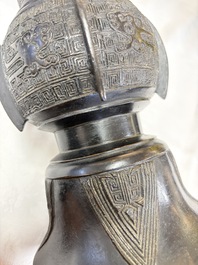 A pair of Chinese archaistic bronze 'Gu' vases, 18th C.