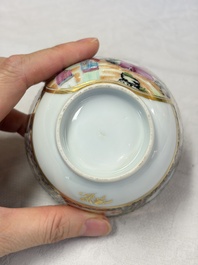 A pair of Chinese Canton famille rose cups and saucers with figural design, Daoguang