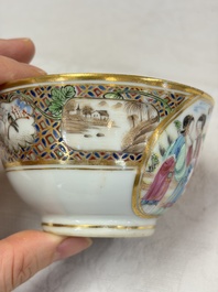 A pair of Chinese Canton famille rose cups and saucers with figural design, Daoguang