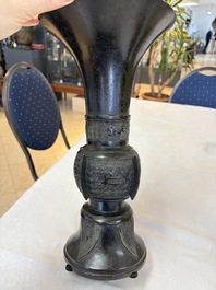 A pair of Chinese archaistic bronze 'Gu' vases, 18th C.