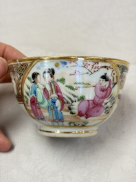 A pair of Chinese Canton famille rose cups and saucers with figural design, Daoguang