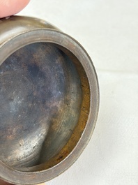 A Chinese or Vietnamese silver-inlaid copper reticulated spherical censer and a silver- and copper-inlaid bronze tripod censer, 19th C.