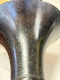 A pair of Chinese archaistic bronze 'Gu' vases, 18th C.