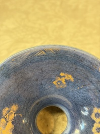 A Chinese powder-blue-ground gilt-decorated spittoon and two gilt-bronze-mounted vases, 18th C.