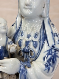 A Chinese blue and white 'Guanyin and child' group, Qianlong