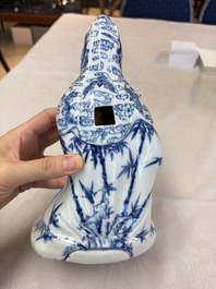 A Chinese blue and white 'Guanyin and child' group, Qianlong