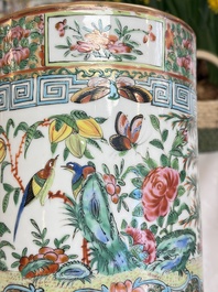 A pair of Chinese Canton famille rose hat stands, a covered vase, a vase and a bowl, 19th C.
