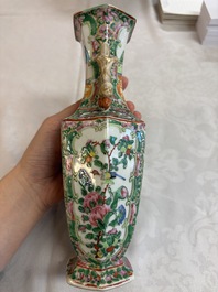 A pair of Chinese Canton famille rose hat stands, a covered vase, a vase and a bowl, 19th C.