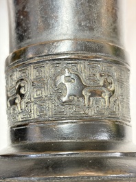 A pair of Chinese archaistic bronze 'Gu' vases, 18th C.