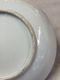 A pair of Chinese Canton famille rose cups and saucers with figural design, Daoguang