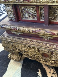 An exceptional Vietnamese gilt-lacquered wood and ivory 'Dragon and Phoenix' throne-shaped altar, 18/19th C.