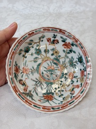 Four Chinese famille verte cups and seven saucers, 19th C.