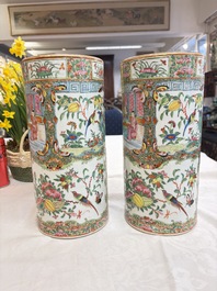 A pair of Chinese Canton famille rose hat stands, a covered vase, a vase and a bowl, 19th C.