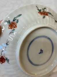 Four Chinese famille verte cups and seven saucers, 19th C.