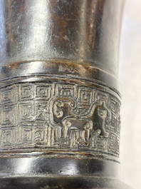A pair of Chinese archaistic bronze 'Gu' vases, 18th C.