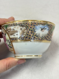 A pair of Chinese Canton famille rose cups and saucers with figural design, Daoguang