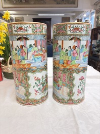 A pair of Chinese Canton famille rose hat stands, a covered vase, a vase and a bowl, 19th C.