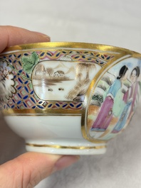 A pair of Chinese Canton famille rose cups and saucers with figural design, Daoguang
