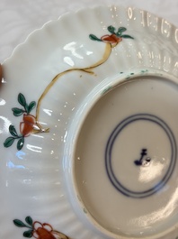 Four Chinese famille verte cups and seven saucers, 19th C.