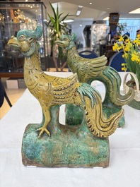 A pair of Chinese sancai-glazed 'Phoenix' roof tiles, Ming