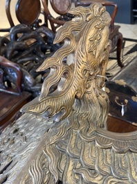 An exceptional Vietnamese gilt-lacquered wood and ivory 'Dragon and Phoenix' throne-shaped altar, 18/19th C.