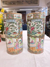 A pair of Chinese Canton famille rose hat stands, a covered vase, a vase and a bowl, 19th C.
