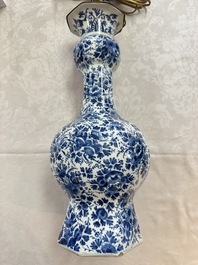 A pair of blue and white Dutch Delft garlic-head vases mounted as lamps, 18th C.