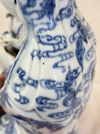A Chinese blue and white 'Guanyin and child' group, Qianlong