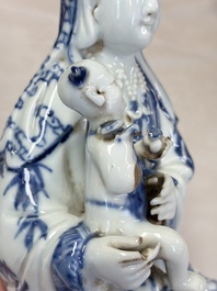 A Chinese blue and white 'Guanyin and child' group, Qianlong