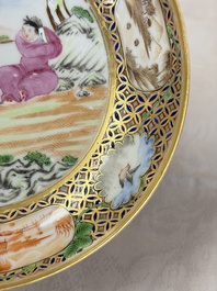 A pair of Chinese Canton famille rose cups and saucers with figural design, Daoguang