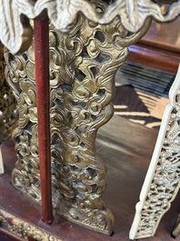 An exceptional Vietnamese gilt-lacquered wood and ivory 'Dragon and Phoenix' throne-shaped altar, 18/19th C.