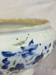 A Chinese blue and white jardini&egrave;re with stand, a 'Chilong' jar and a famille rose covered tureen, Guanyao 官窑 mark, 19th C.