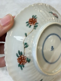 Four Chinese famille verte cups and seven saucers, 19th C.