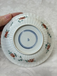 Four Chinese famille verte cups and seven saucers, 19th C.