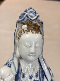 A Chinese blue and white 'Guanyin and child' group, Qianlong