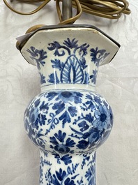 A pair of blue and white Dutch Delft garlic-head vases mounted as lamps, 18th C.