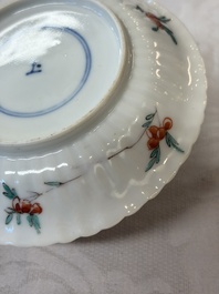 Four Chinese famille verte cups and seven saucers, 19th C.