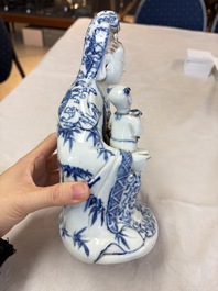 A Chinese blue and white 'Guanyin and child' group, Qianlong