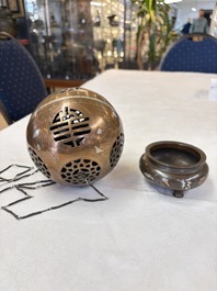 A Chinese or Vietnamese silver-inlaid copper reticulated spherical censer and a silver- and copper-inlaid bronze tripod censer, 19th C.