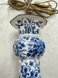 A pair of blue and white Dutch Delft garlic-head vases mounted as lamps, 18th C.