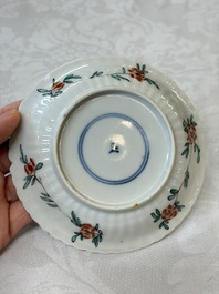 Four Chinese famille verte cups and seven saucers, 19th C.
