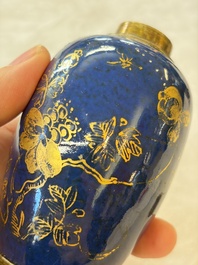 A Chinese powder-blue-ground gilt-decorated spittoon and two gilt-bronze-mounted vases, 18th C.