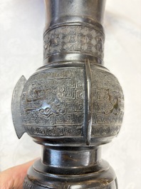 A pair of Chinese archaistic bronze 'Gu' vases, 18th C.