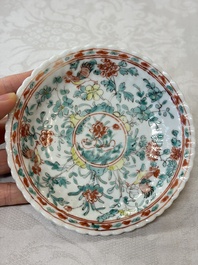 Four Chinese famille verte cups and seven saucers, 19th C.