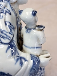 A Chinese blue and white 'Guanyin and child' group, Qianlong
