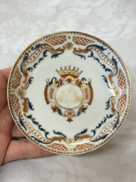 A Chinese armorial export 12-piece tea service with crowned monograms, Qianlong