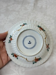 Four Chinese famille verte cups and seven saucers, 19th C.