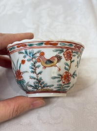 Four Chinese famille verte cups and seven saucers, 19th C.