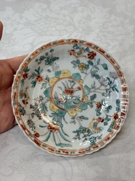 Four Chinese famille verte cups and seven saucers, 19th C.