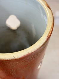 A Chinese famille rose spittoon, a famille verte covered double-gourd vase and a gilt-decorated coral-red-ground hat stand, Daoguang mark, 19th C.